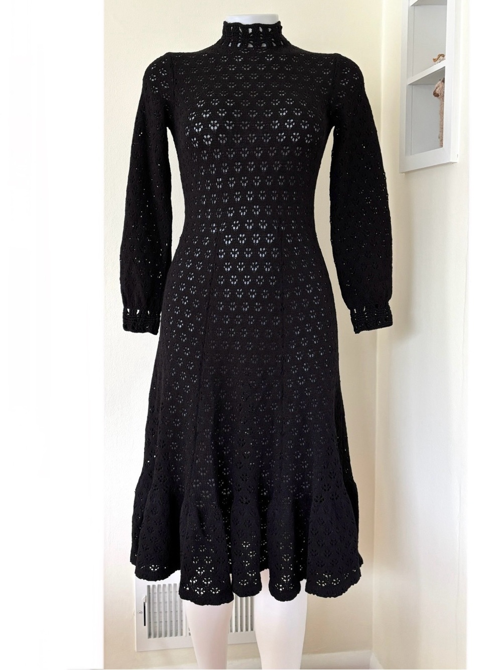 1970s black crochet knit high neck dress with bishop long sleeves ruffle skirt